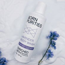 Load image into Gallery viewer, Born Purities Lavender Body Wash bottle with lavender flowers on a white background
